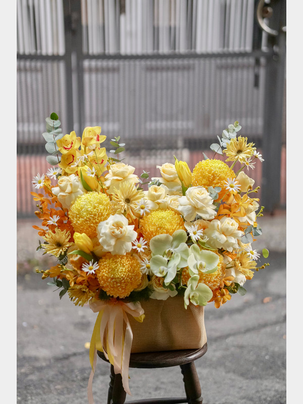 Giỏ hoa khai trương tone vàng cam